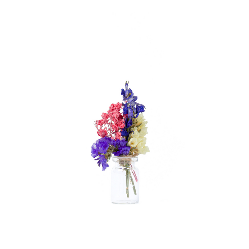 A colourful dried flower mini bouquet in a mini vase