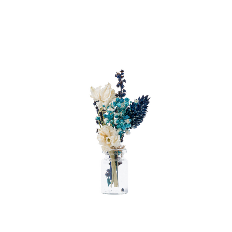 A blue dried flower mini bouquet in a mini vase