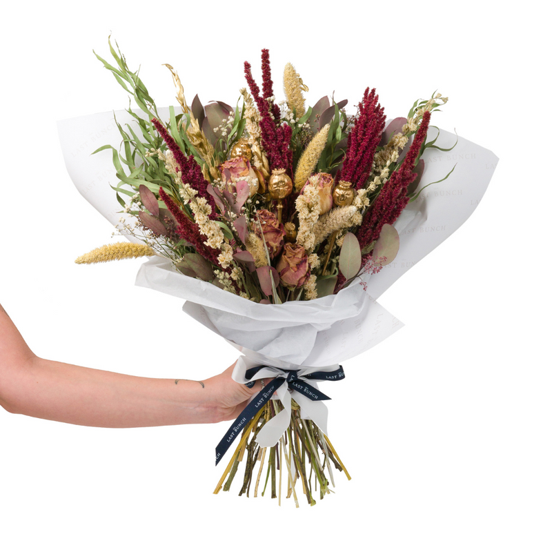 Red, green and gold Christmas dried flower bouquet