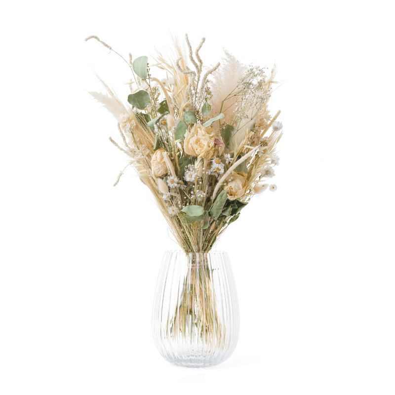 A cream dried flower bouquet with dried peonies