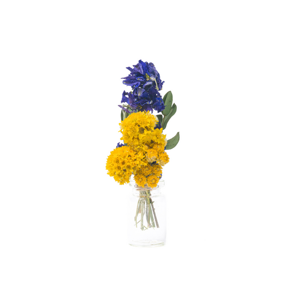 A blue and yellow dried flower mini bouquet in a mini vase