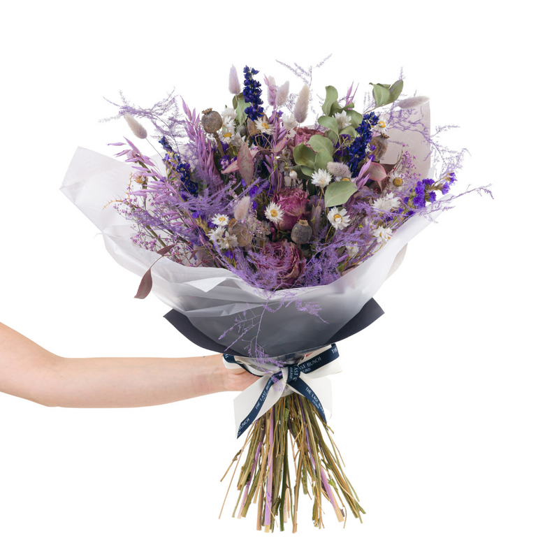 A purple dried flower bouquet