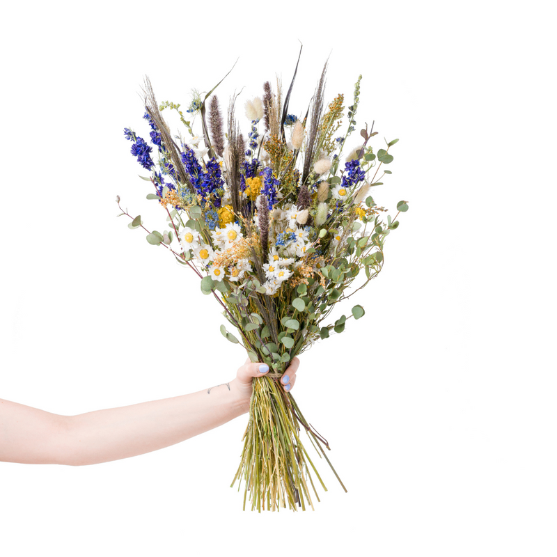 A blue and yellow dried flower bouquet